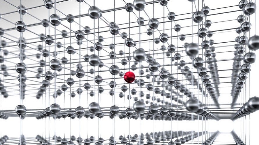 Netzwerk aus grauen Metallkugeln, in deren Mitte sich eine rote Kugel befindet Netzwerk aus grauen Metallkugeln, in deren Mitte sich eine rote Kugel befindet